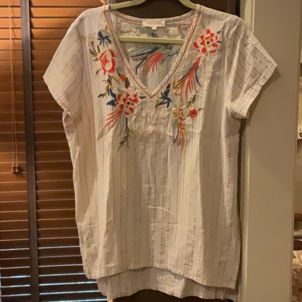 Beautiful embroidery top.  Johnny Was style.  Design and colors perfect.  As new